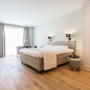 Kamer met een King Size Bed